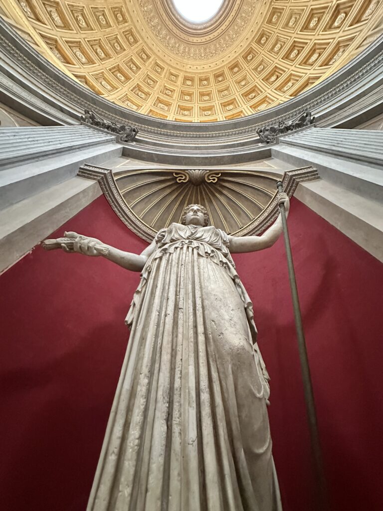 statue at the Vatican Museum and sistine chapel in rome italy must do