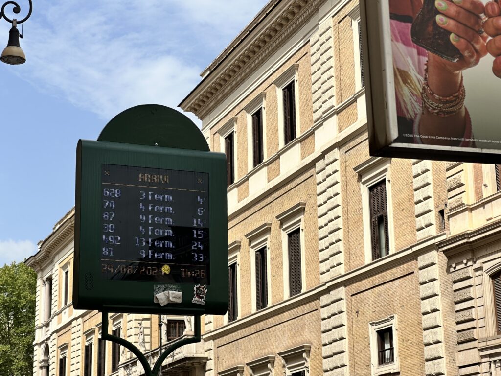 View of bus stop sign in Rome Italy for getting around on a 2-day Rome itinerary