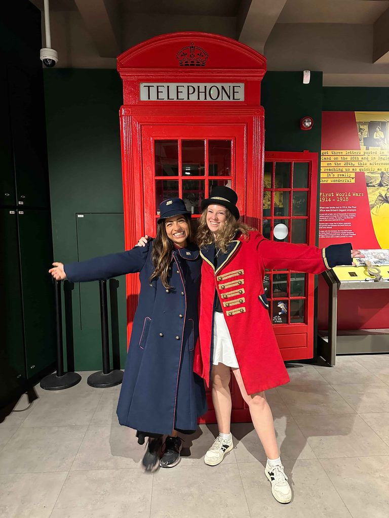 postal museum london girls dress in old fashioned mail uniformes