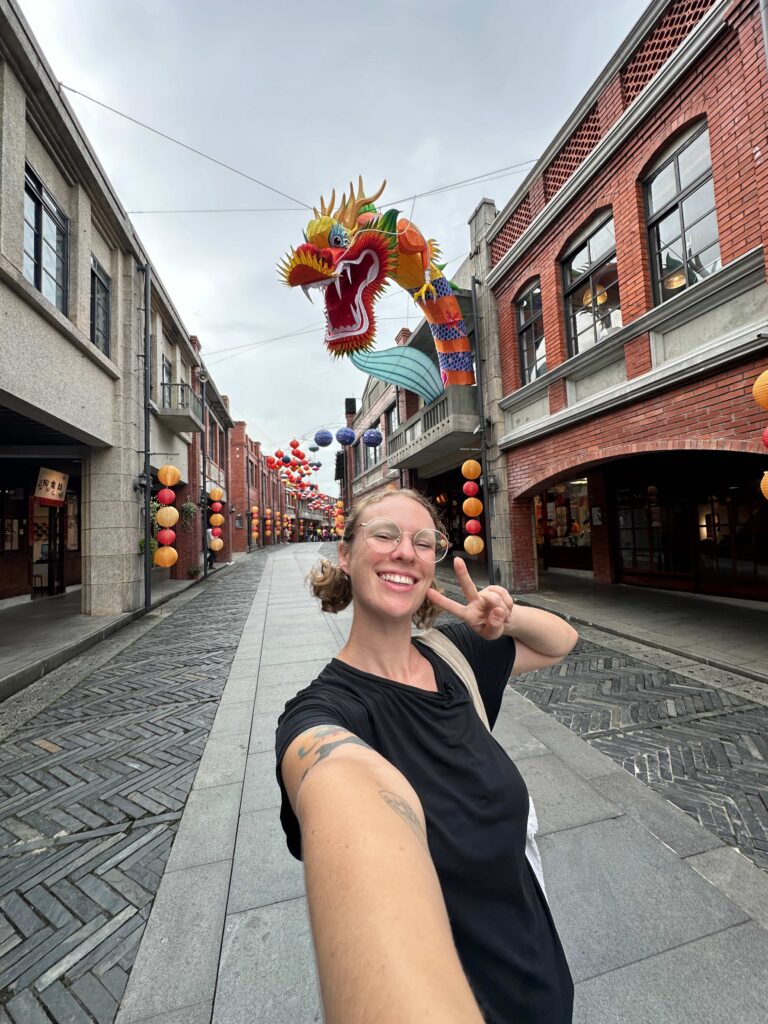 girl gives the peace sign at taiwan national culture center in luodong taiwan