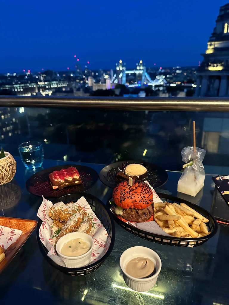 food and drinks at Savage Garden overlooking tower bridge in London best bars with views in London