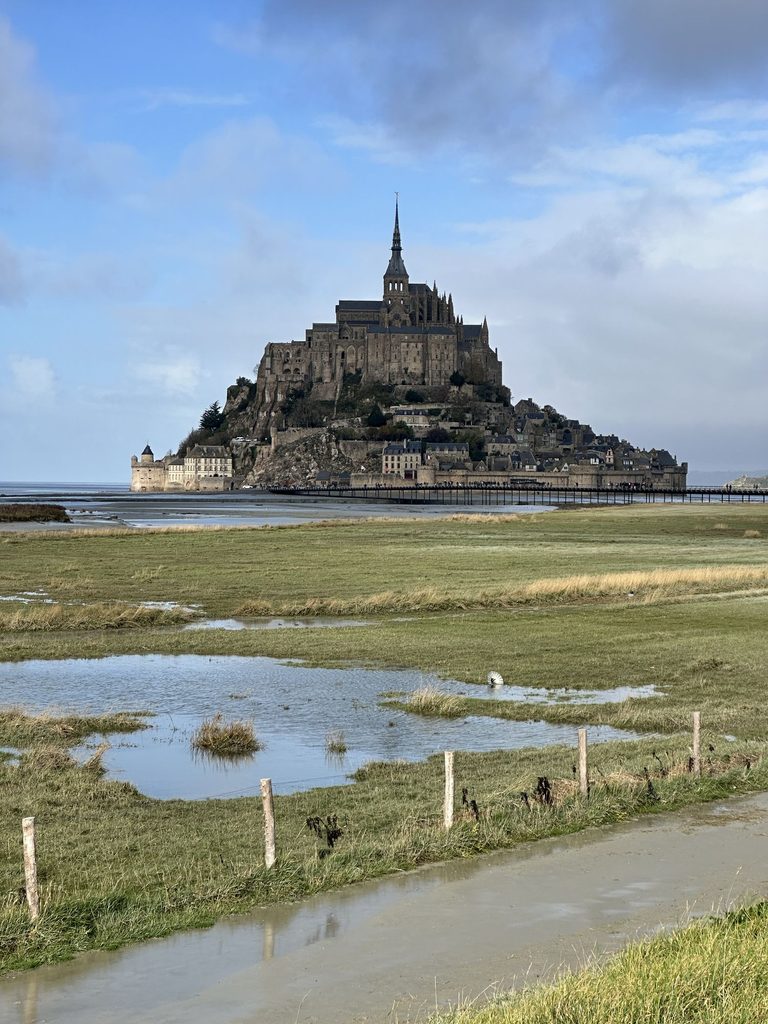 mont saint michel in the distance on a november day on a day trip from paris
