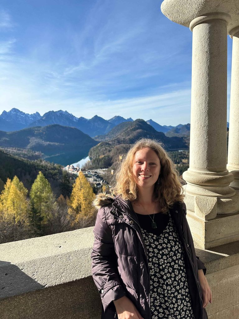 The view from inside Neuschwanstein Castle overlooking the lake and mountains worth visiting on a day trip from Munich
