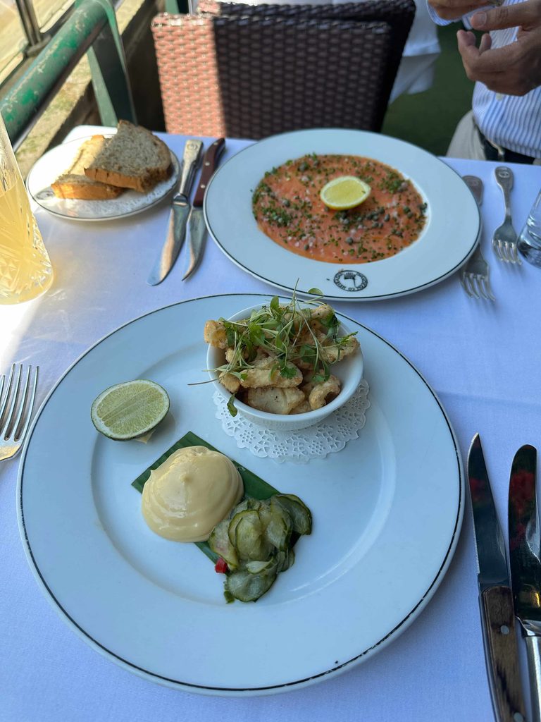 salmon start and fried squid at Boisdale scottish restaurant in London