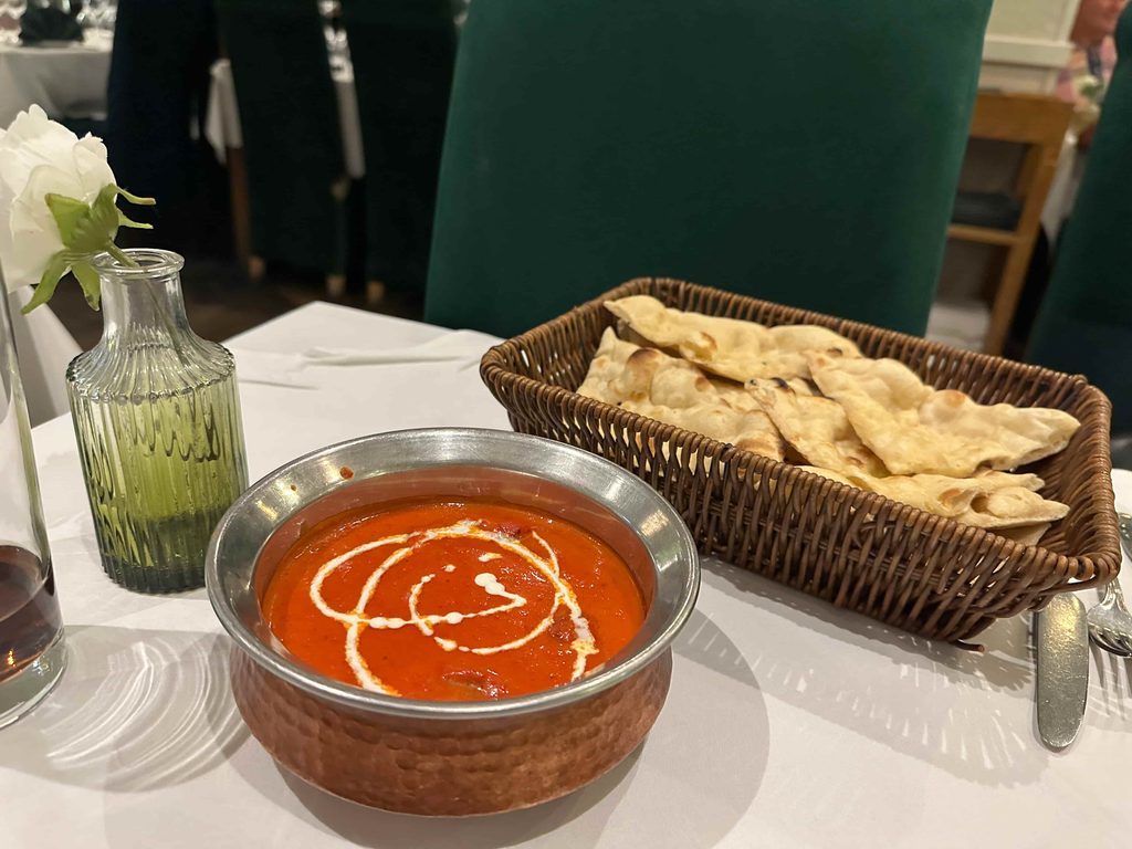 chicken tikka masala and garlic naan at the standard in shoreditch london a part of the go city city all inclusive pass