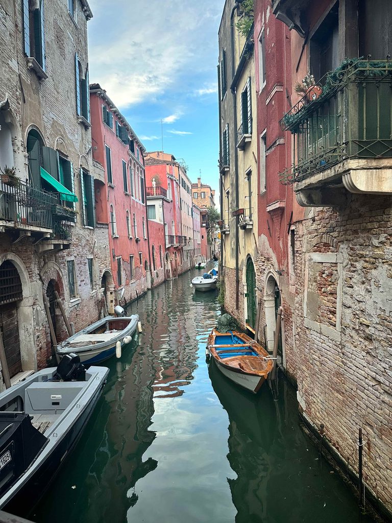 view of venice italy canals with boats