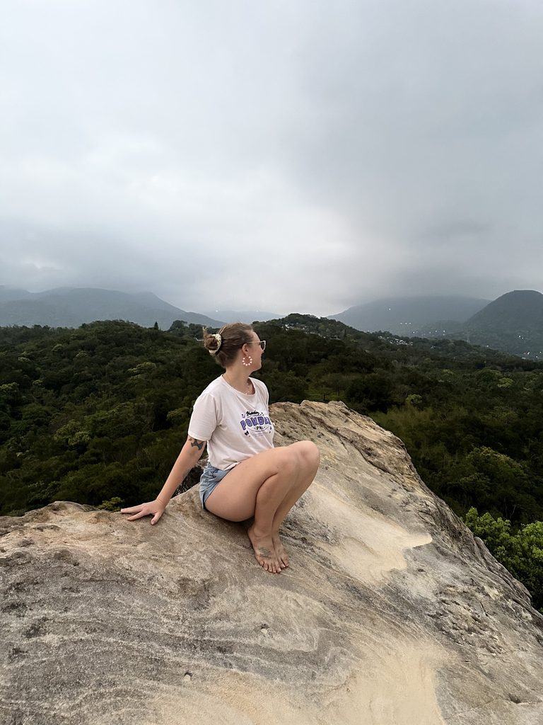 girl overlooks the mountains of taiwan from battleship rock viewpoint
