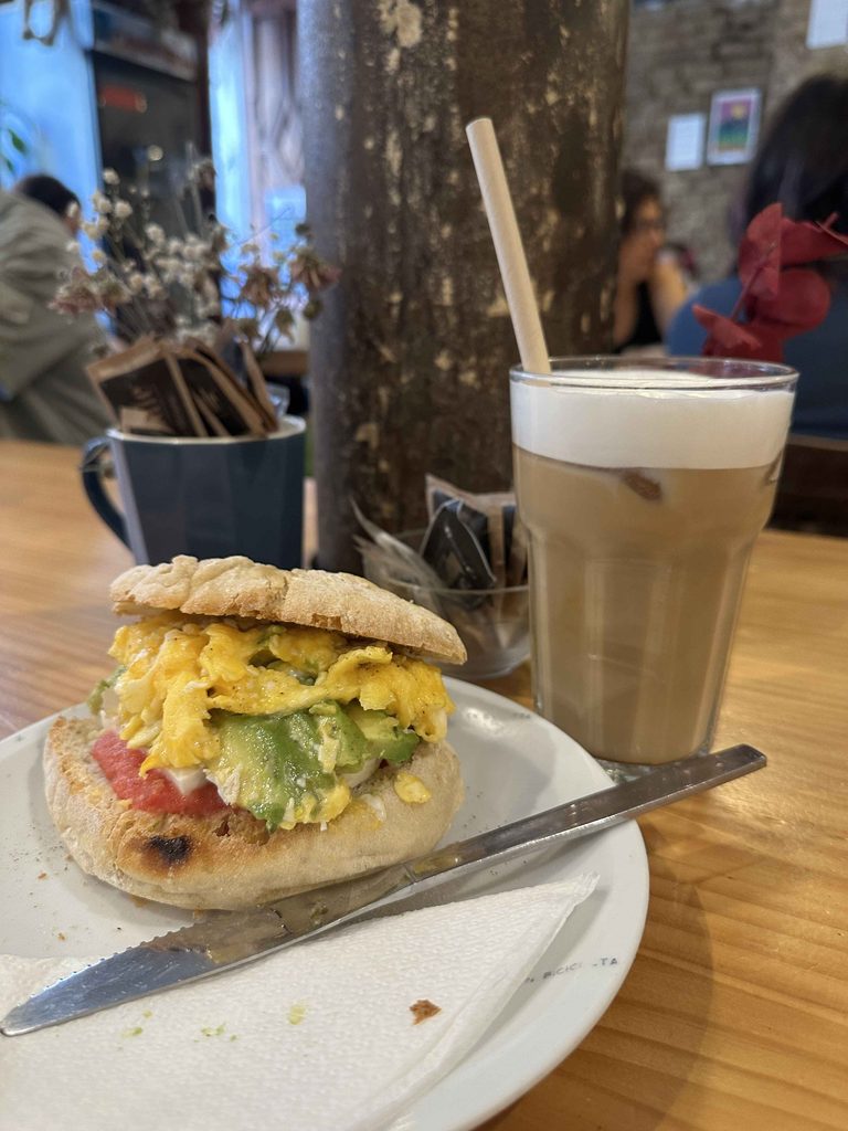 breakfast toast sandwich and iced latte at la gata en bici in seville spain